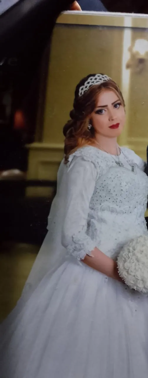 صورة للمجني عليها من زفافها