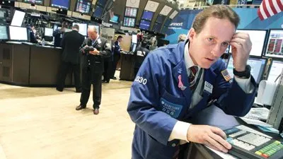  الأسهم الأمريكية تقلص خسائرها بعد بيانات القطاع الصناعي 