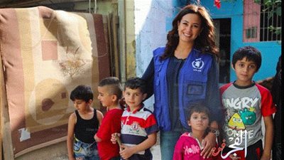 بالصور.. هند صبري في زيارة للاجئين السوريين بلبنان