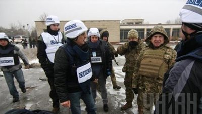  روسيا توافق على تسليح مراقبين أجانب في أوكرانيا 