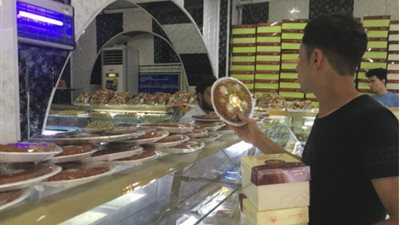 واشنطن بوست: رمضان في العراق.. كثير من الحلوى والياميش