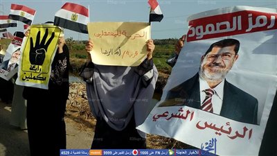 الشرطة تفرق مسيرة من نساء الإخوان على طريق 