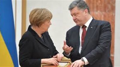 بوروشينكو وميركل تبادلا الآراء حول تطوير عملية مينسك هاتفيا