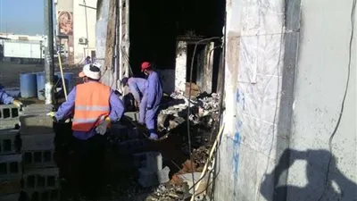 أمانة تبوك تمنع تطاير نفايات مستودع  