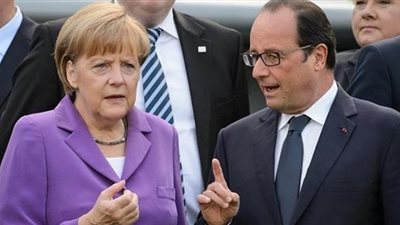  هولاند وميركل يتوافقان على تكثيف التعاون الأمني
