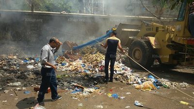 السيطرة على حريق فى مخلفات بمدينة فيصل بالإسكندرية ..(صور)