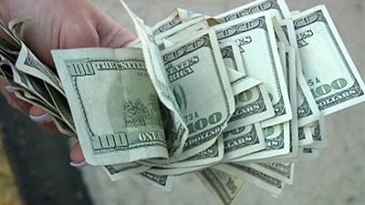 ضبط تاجري عملات أجنبية بالسوق السوداء بالإسكندرية 