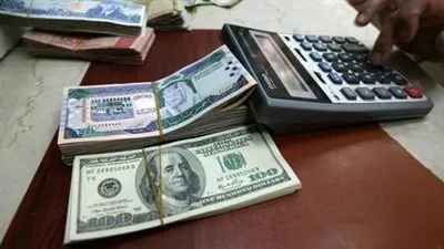 المركزي السعودي: المملكة ملتزمة بربط الريال بالدولار