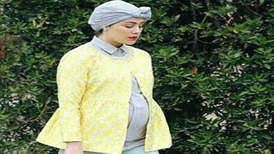  اطلالة مميزة وعصرية من ملابس حمل المرأة المحجبة