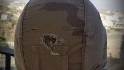 رصاصة في خوذة رأس 