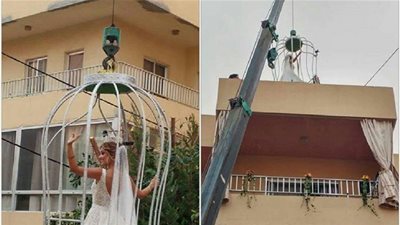 عروسة لبنانية خطفت الأنظار في حفل زفافها بزفها الى عريسها في قفص