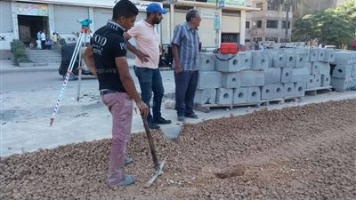 الطرق تبدأ فى أعمال رصف طريق النبوى المهندس بالإسكندرية (صور)