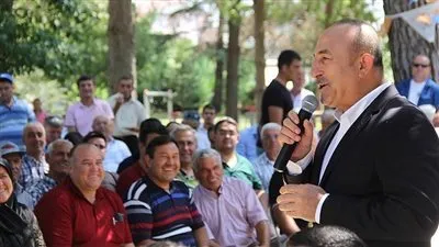 أوغلو يطالب السفراء الأمريكيين بعدم التعامل كـ