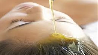 فوائد زيت الخروع لنمو الشعر 