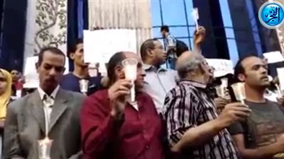 وقفة صامتة حدادًا على ضحايا مركب رشيد على سلم 