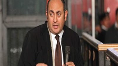 خالد علي يطلب بمحاكمه 