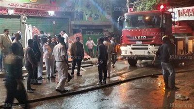 الأمن يراقب حريق 