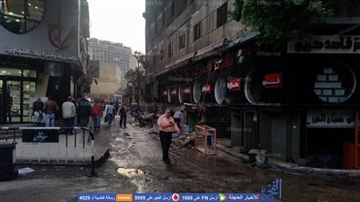 استمرار انقطاع الكهرباء عن عقار الفجالة المحترق (صور)