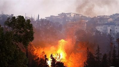 الدفاع المدني الفلسطيني يشارك في اطفاء حيفا والقدس