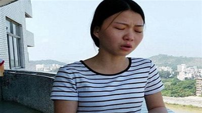 فتاة صينية تعرض نفسها للبيع . والسبب مثير للشفقة!