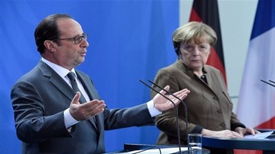 أولاند وميركل يوافقان على تمديد العقوبات على روسيا