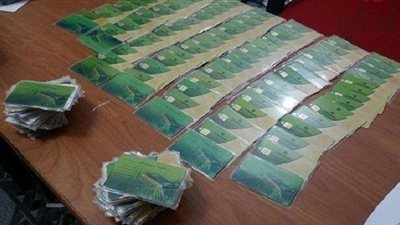 ضبط بطاقات تموينية تستخدم بغرض الضرب الوهمى على ماكينات صرف الخبز في الإسكندرية 