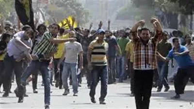 اشتباكات بين الأهالى وأنصار المعزول  بكفر الدوار