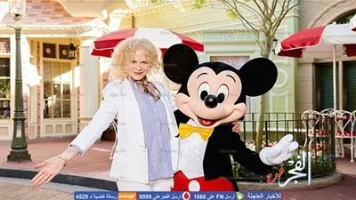 نيكول كيدمان تهرب من ضغط الأوسكار لديزني لاند (صور)