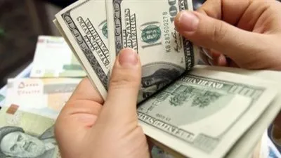 ياسر عمر: انخفاض سعر الدولار لـ13 جنيهًا بنهاية 2017