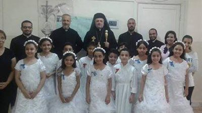 كنيسة العذراء أم النور بإمبابة للكاثوليك تحتفل بالمناولة الاحتفالية