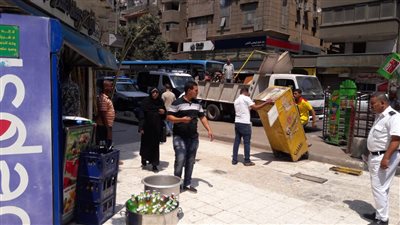 المرافق تزيل الأكشاك المخالفة بحي الدقي 