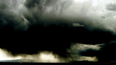 جهاز شئون البيئة: ظاهرة جوية طبيعية وراء السحابة السوداء