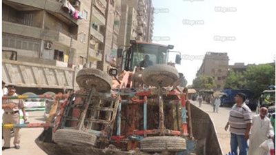 حملات انضباطية لرفع الإشغالات بأسوان والمنيا والقليوبية (صور)