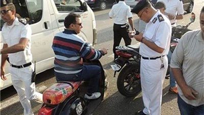 إزالة 76 موقف عشوائي في حملات مرورية بالجيزة