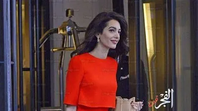 إشراقة على وجه أمل علم الدين أثناء توجهها إلى الأمم المتحدة