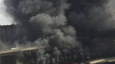 الحماية المدنية تحاول السيطرة على حريق مخزن تابع لحي الهرم (صور)