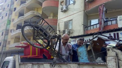 إزالة الإشغالات بـ 13 منطقة في الجيزة