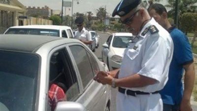 إزالة 69 موقفا عشوائيا في حملات مرورية بالجيزة