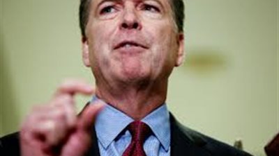 كومى: التحقيق مع 4 أمريكيين حول التآمر مع روسيا