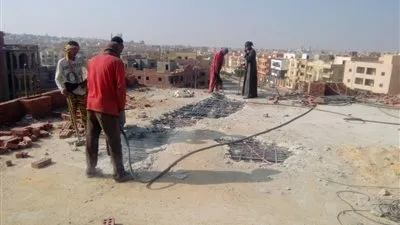  جهاز القاهرة الجديدة يزيل مخالفات المبانى بالتجمع الخامس