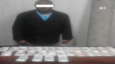 ضبط أفريقي بتهمة الاتجار في النقد الأجنبي بعابدين