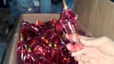 ضبط 15 ألف عبوة عطور مختلفة الأنواع مغشوشة المصدر ببولاق الدكرور