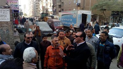 شرطة المرافق تشن حملات مكبرة لرفع الإشغالات بشوارع العمرانية