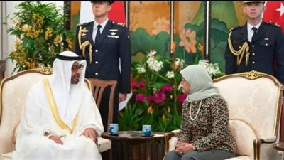 ولي عهد أبوظبي ورئيسة سنغافورة يبحثان علاقات التعاون