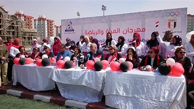 اللجنة الأولمبية تشارك في مهرجان يوم المرأة العالمي (صور)