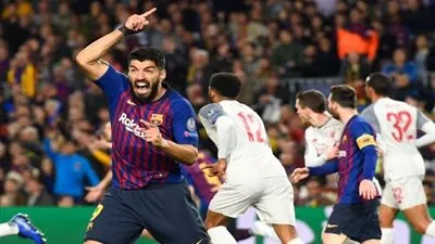 سر شجار سواريز ونجم ليفربول في كامب نو