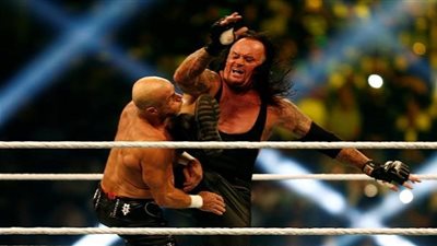 مصارعة.. أندرتيكر يقهر جولدبيرج.. وأورتن 