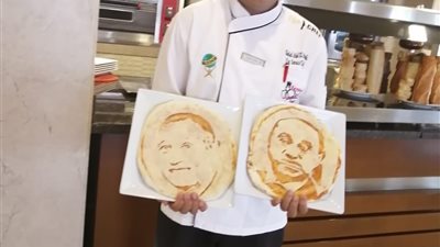 احتفالا بوجودهما.. شيف يرسم بيبو وأحمد أحمد على بيتزا في الغردقة (صور) 