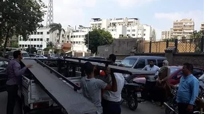 حملة لإزالة إشغالات الطرق بحي العجوزة