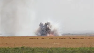 عدد من عائلات مسلحي داعش يفرون من مخيم عين عيسى بعد القصف التركي